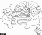 Els quatre Teletubbies asseguts a la taula a l'hora de dinar