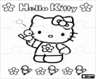 Puzle de Hello Kitty amb ocellets i flors