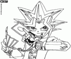 Yugi amb les cartes del joc de Duel de Monstres. Yu-Gi-Oh