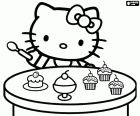 La Hello Kitty amb una cullera a la mà a punt per menjar uns pastissets cupcakes deliciosos. La Hello Kitty és molt llaminera, li encanten els dolços