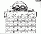 El cap del Pare Noel sortint de la xemeneia de la teulada